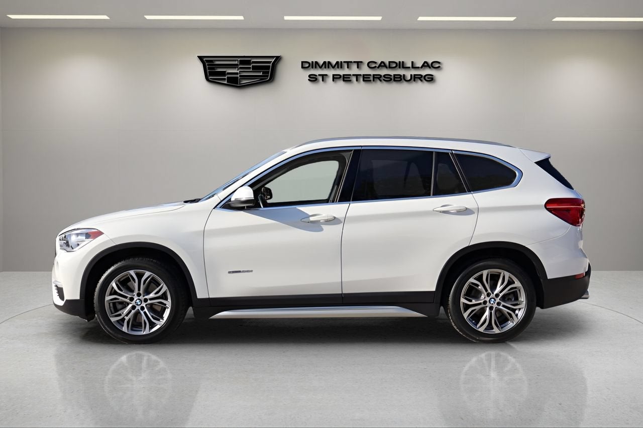 Used 2017 BMW X1 28i with VIN WBXHU7C34H5H38409 for sale in Pinellas Park, FL