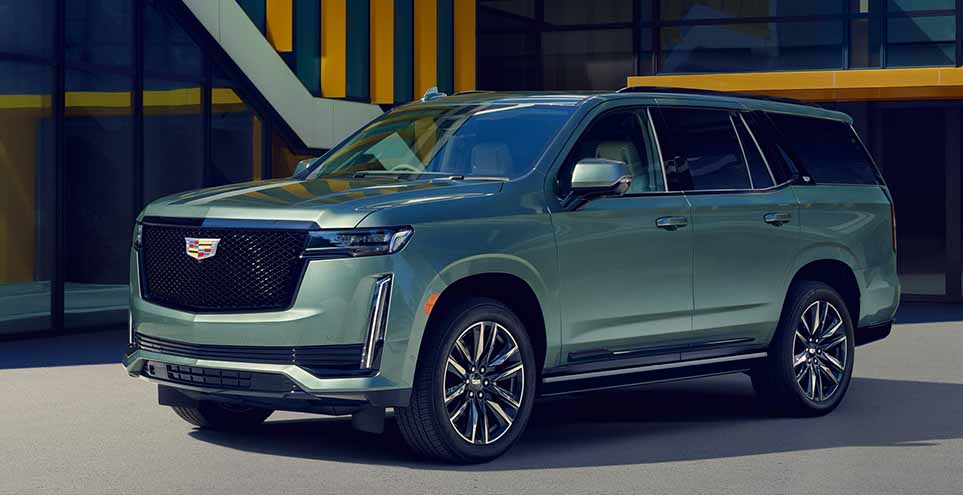 Cadillac Escalade parked in city environment